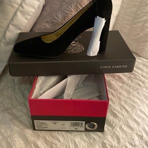 Brand new pair of suede black heels.